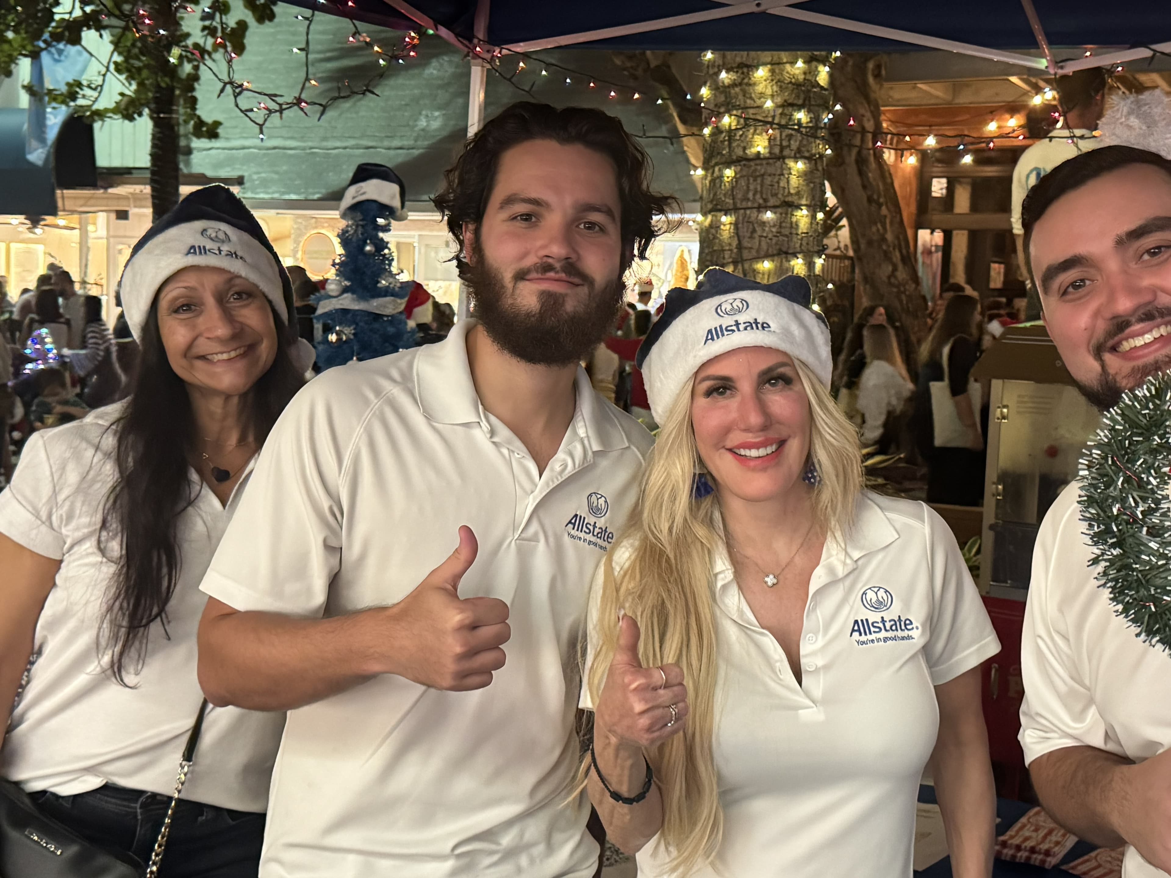 The Lisa Faina Agency team in Allstate gear at the Christmas on Las Olas holiday celebration in Fort Lauderdale